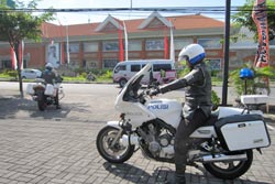 2 police motor bikes escort